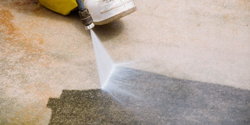 Pressure washing a commercial exterior surface