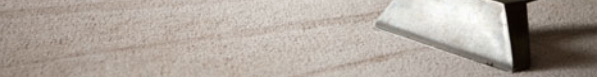 Commercial carpet being cleaned with professional equipment
