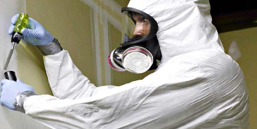 Protective-equipment technician during remediation work