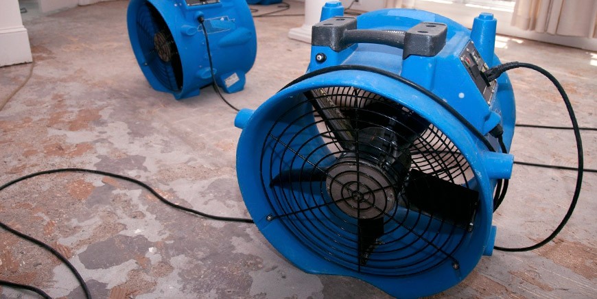 Professional fans used to dry a floor