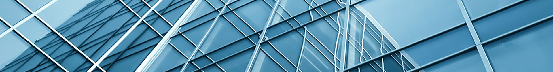 Glass façade of a modern commercial building